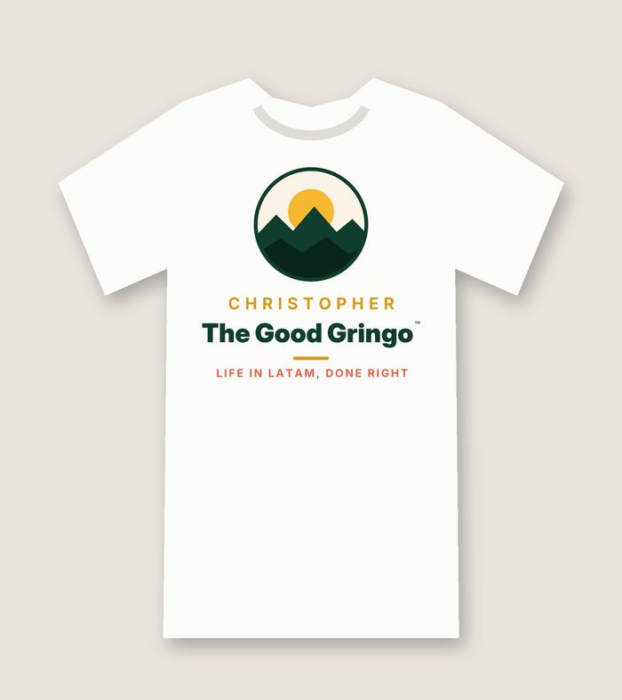 White T-shirt with The Good Gringo sun and mountains badge